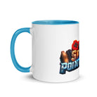 Ceramic mug with blue rim, handle, and inside featuring a vibrant gaming controller and text design. Perfect for adding color to coffee routines.