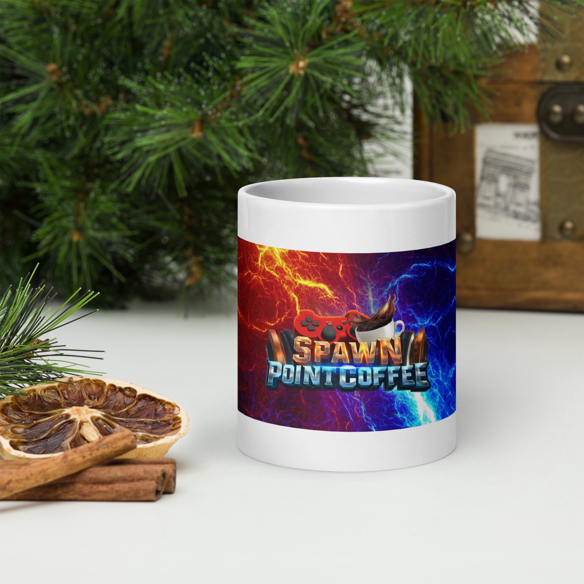 Stylish SPC Lightning Mug with vivid print, surrounded by festive greenery and cinnamon sticks, perfect for coffee or tea lovers.